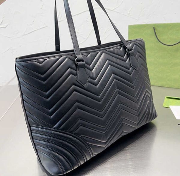 ophidia tote shopping bag quilted black handbag large capacity pocket genuine leather fashion letters magnetic buckle interior zip pocket
ophidia tote shopping bag quilted black handbag large capacity pocket genuine leather fashion letters magnetic buckle interior zip pocket