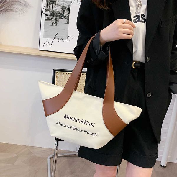 fashion large-capacity canvas bag female shoulder bag armpit bag commuter bag tot bag 0320
fashion large-capacity canvas bag female shoulder bag armpit bag commuter bag tot bag 0320