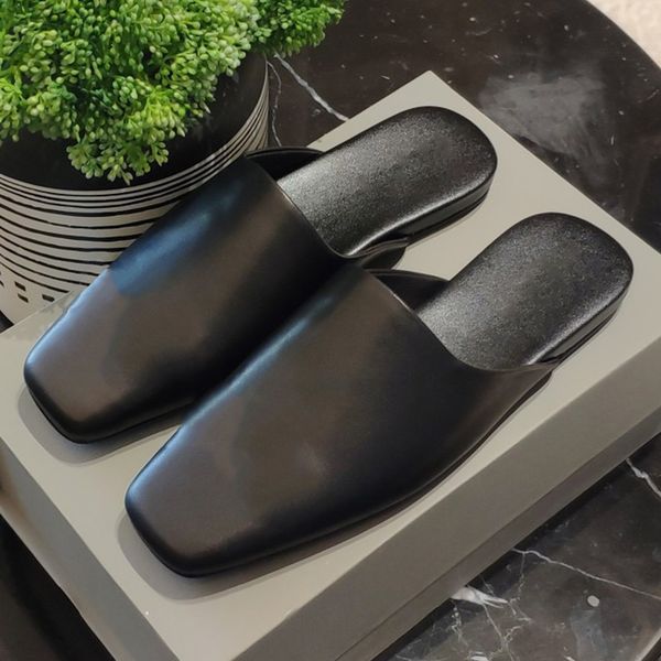 womens cosy mule in black designer sandals cosy smooth calfskin rounded toe with gold signature logo on the upper for easy wearing taking of
womens cosy mule in black designer sandals cosy smooth calfskin rounded toe with gold signature logo on the upper for easy wearing taking of