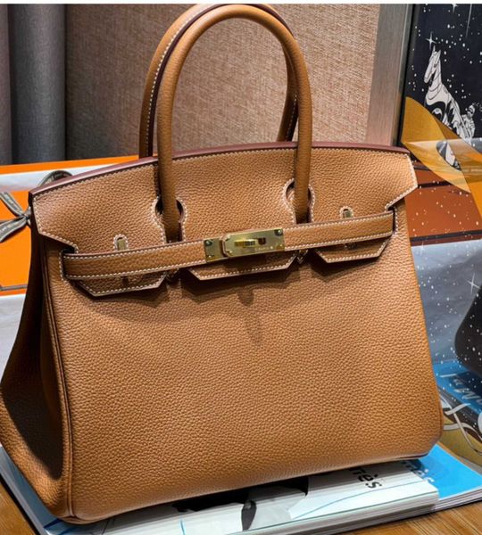original h ermes brikis's tote bags wholesale 30cm golden brown grade togo leather fashion commuter handbag women's bag with real
original h ermes brikis's tote bags wholesale 30cm golden brown grade togo leather fashion commuter handbag women's bag with real