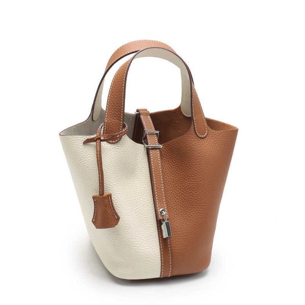 h bag designer original new leather layer lychee grain cowhide color matching vegetable basket women's bag fashion hand bucket bag
h bag designer original new leather layer lychee grain cowhide color matching vegetable basket women's bag fashion hand bucket bag