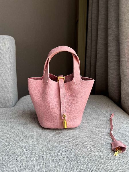 designer original herms gold button mini vegetable basket bag leather bucket head layer cowhide hand women's small hand
designer original herms gold button mini vegetable basket bag leather bucket head layer cowhide hand women's small hand