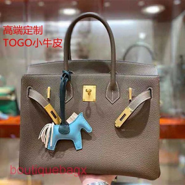 designer h ermess brikiss bags online shop 2023 high-end bag new togo calf leather women's portable buckle
designer h ermess brikiss bags online shop 2023 high-end bag new togo calf leather women's portable buckle