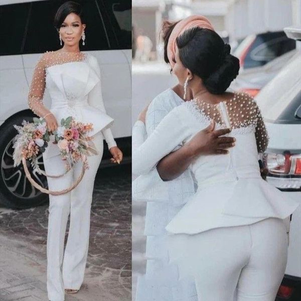 illusion long sleeve jumpsuit a-line wedding dresses with peplum 2023 o-neck pearls beaded bohemian garden bridal gown pant suit, White
illusion long sleeve jumpsuit a-line wedding dresses with peplum 2023 o-neck pearls beaded bohemian garden bridal gown pant suit, White