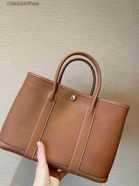 designer herms garden party bags price genuine bag full handmade wax thread high-quality layer leather han
designer herms garden party bags price genuine bag full handmade wax thread high-quality layer leather han