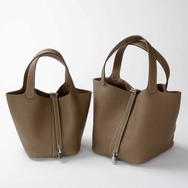 designer original herms 2023 new bag vegetable basket hand high end layer togo leather hand women's bucket
designer original herms 2023 new bag vegetable basket hand high end layer togo leather hand women's bucket
