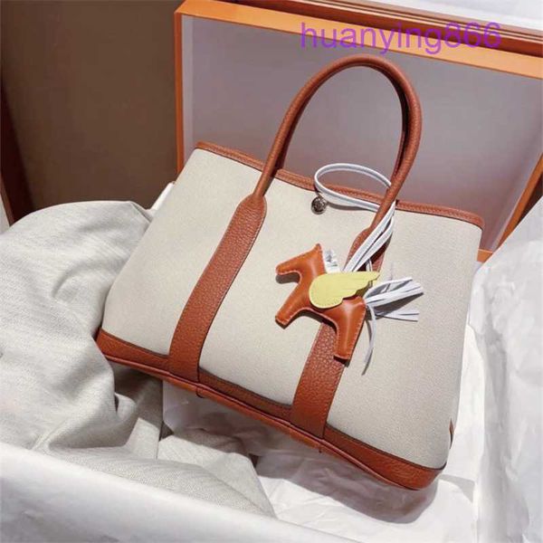 designer herms party garden evening bags for sale 2022 new canvas with layer cowhide women's bag garden hand leather large cap
designer herms party garden evening bags for sale 2022 new canvas with layer cowhide women's bag garden hand leather large cap