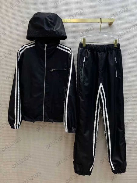 black two pieces pants chest triangle logo decoration hooded long sleeve zipper jacket side bump color striped elastic waist tracksuit pants, White
black two pieces pants chest triangle logo decoration hooded long sleeve zipper jacket side bump color striped elastic waist tracksuit pants, White