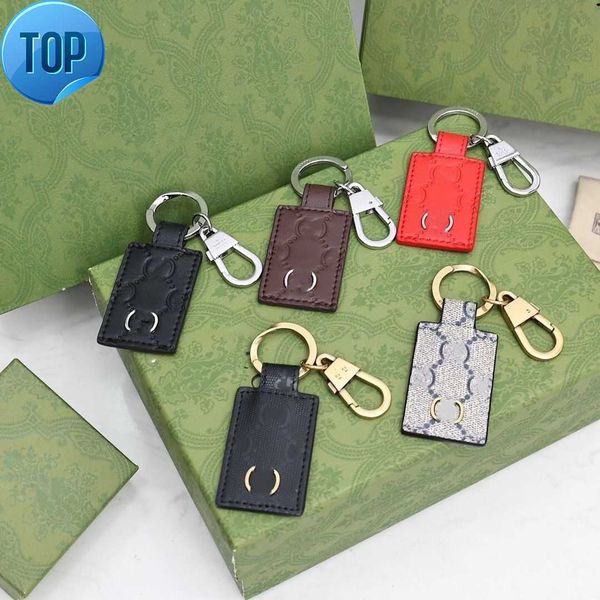 2022 keychain key chain buckle lovers car keychain handmade leather keychains men women bags pendant accessories 19 color with box and dust, Silver 
2022 keychain key chain buckle lovers car keychain handmade leather keychains men women bags pendant accessories 19 color with box and dust, Silver