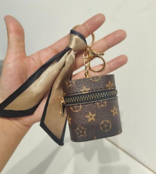 mobile phone key chain lipstick storage bag headset protection case mini hanging bag key chain charm accessories women's leather bag pe, Silver
mobile phone key chain lipstick storage bag headset protection case mini hanging bag key chain charm accessories women's leather bag pe, Silver