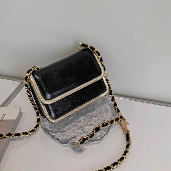 two color stitching mini waist bag classic black leather gold tone metal diagonal shoulder chain luxury designer fashion handbag outdoor por
two color stitching mini waist bag classic black leather gold tone metal diagonal shoulder chain luxury designer fashion handbag outdoor por
