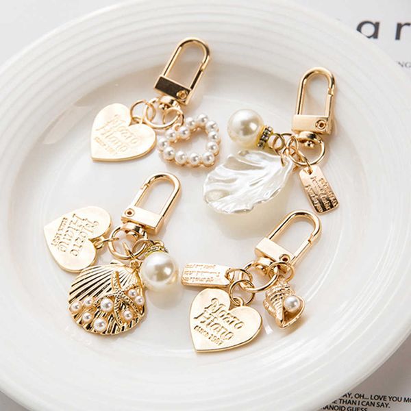 key rings women girls heart shell pendant keychain fashion elegant letter label imitation pearls key chain handbag hanging pendant keyring r, Slivery;golden
key rings women girls heart shell pendant keychain fashion elegant letter label imitation pearls key chain handbag hanging pendant keyring r, Slivery;golden