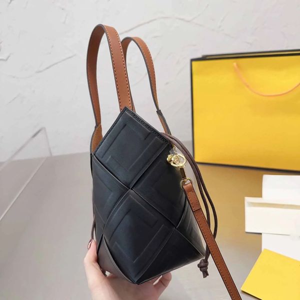 designer string bucket bag weave crossbody mini handbag removable inner pouch gold hardware
designer string bucket bag weave crossbody mini handbag removable inner pouch gold hardware