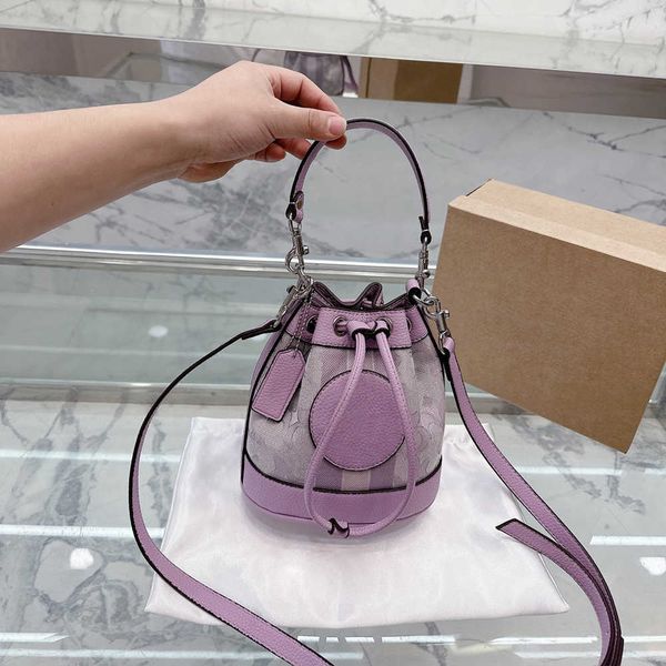 designer drawstring bag handle luxury womens men the leather handbag tote shoulder fashion buckets purse crossbody bags 230301
designer drawstring bag handle luxury womens men the leather handbag tote shoulder fashion buckets purse crossbody bags 230301