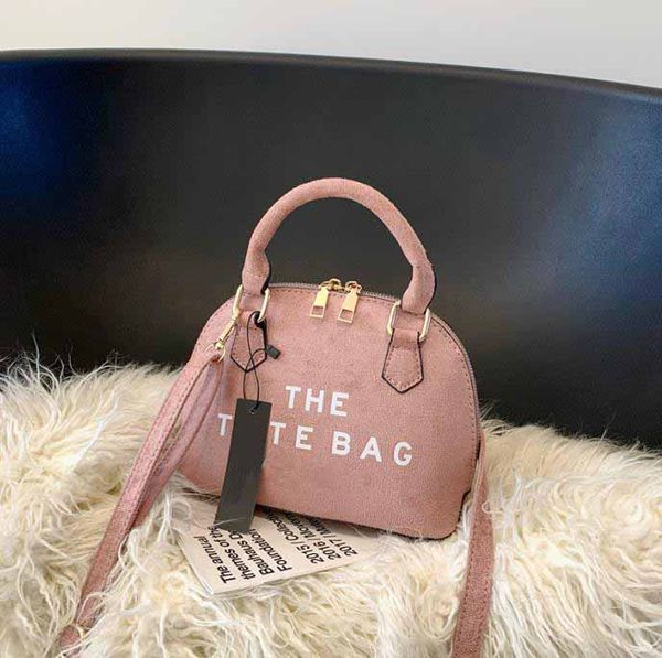 new luxury leather shell bag women's new simple handbag fashion bag the tote bag messenger shoulder bag, Red;black
new luxury leather shell bag women's new simple handbag fashion bag the tote bag messenger shoulder bag, Red;black