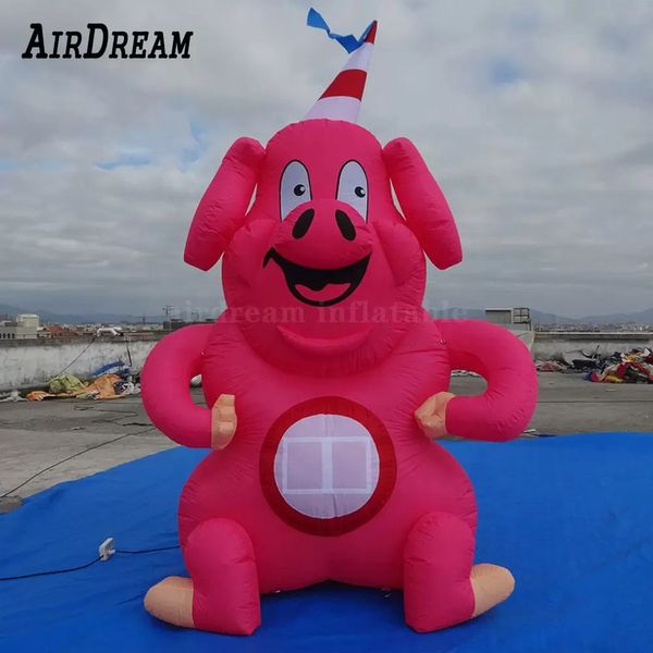 Image of pink inflatable pig model cartoon animal character with blower for advertising decoration