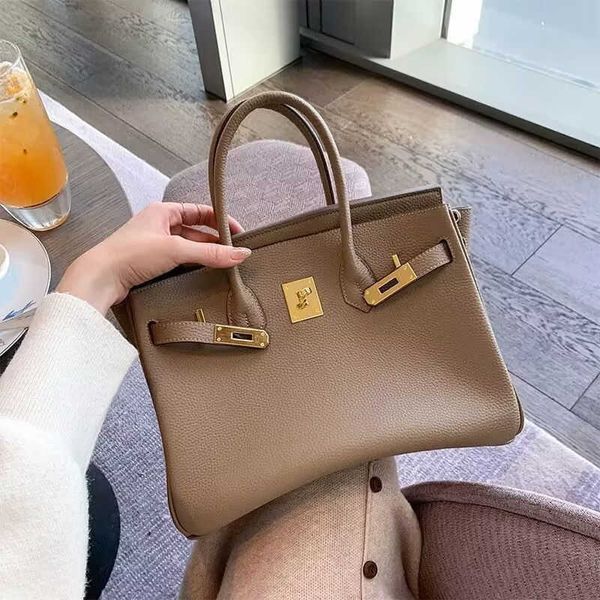designer bag leather lychee pattern bag women's new fashion large capacity portable women's bag high sense single shoulder crossbo
designer bag leather lychee pattern bag women's new fashion large capacity portable women's bag high sense single shoulder crossbo