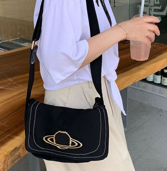 evening bags new women's fashion saturn canvas preppy style female message handbags gilrs single shoulder bag crossbody bags k230313
evening bags new women's fashion saturn canvas preppy style female message handbags gilrs single shoulder bag crossbody bags k230313