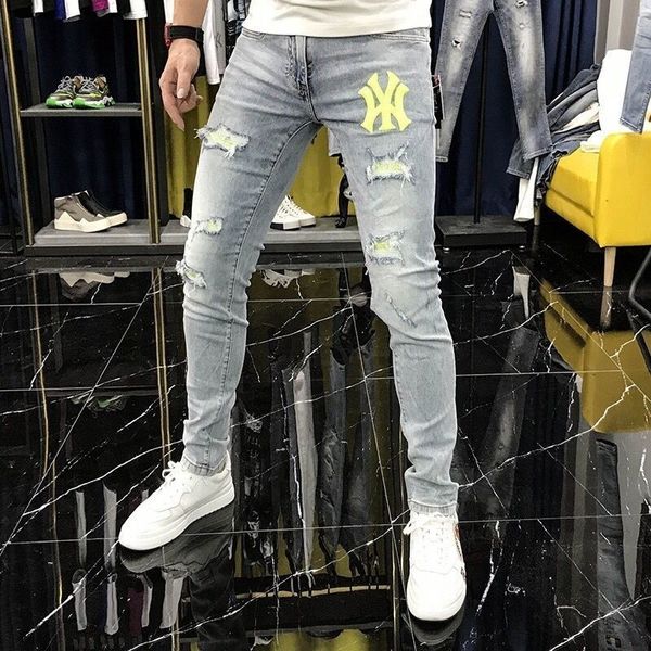 men s jeans summer small foot slim fit letter light blue skinny european fashion pants holes pasted elastic 230313
men s jeans summer small foot slim fit letter light blue skinny european fashion pants holes pasted elastic 230313