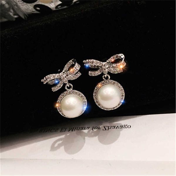 dangle chandelier small bow pearl earrings short temperament south korea east gate fashion net red earrings small fresh silver needle earrin
dangle chandelier small bow pearl earrings short temperament south korea east gate fashion net red earrings small fresh silver needle earrin