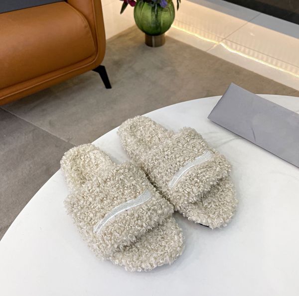 ladies woolen sheepskin winter slipper fur wool warm and comfortable wear resistant fashion lady rubber flat slippers, Black
ladies woolen sheepskin winter slipper fur wool warm and comfortable wear resistant fashion lady rubber flat slippers, Black
