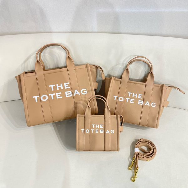 the tote bag marc totes women designer handbag handbags women fashion all-match shopper solid color leather shoulder bags
the tote bag marc totes women designer handbag handbags women fashion all-match shopper solid color leather shoulder bags