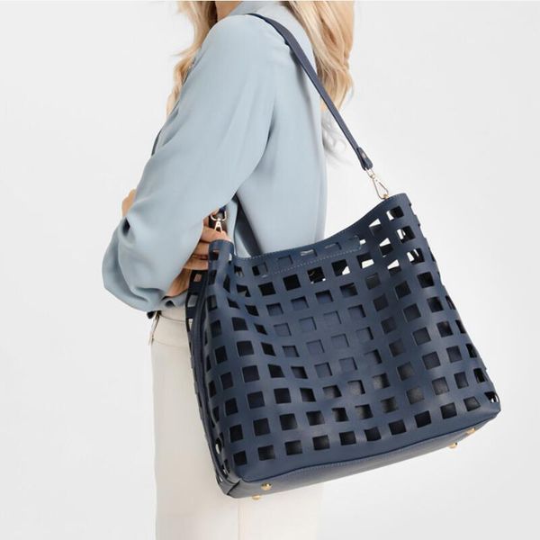 fashion tote bag outdoor women's bag checked hollow design pu outdoor shopping handbag
fashion tote bag outdoor women's bag checked hollow design pu outdoor shopping handbag