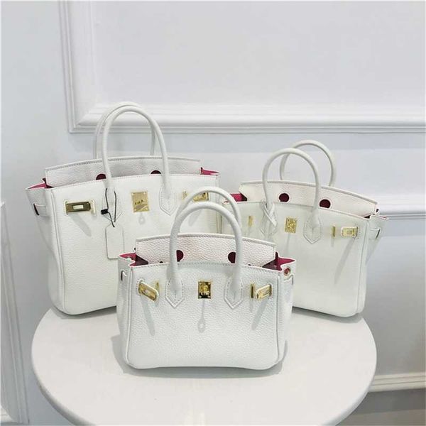 designer bag birkin wrap cowhide color contrast with pink color matching inside and outside
designer bag birkin wrap cowhide color contrast with pink color matching inside and outside