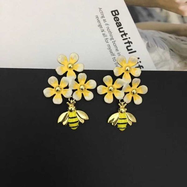 sweet and simple temperament personality hundred match models flower color enamel bee earrings earrings 0331, Golden
sweet and simple temperament personality hundred match models flower color enamel bee earrings earrings 0331, Golden