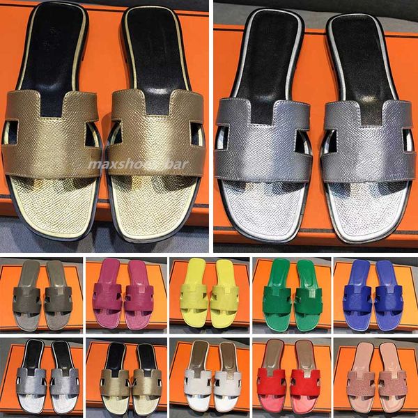 2023 famous brand beach slippers classic flat heel summer designer fashion flops leather lady slides women shoes l bath ladies sandals large
2023 famous brand beach slippers classic flat heel summer designer fashion flops leather lady slides women shoes l bath ladies sandals large