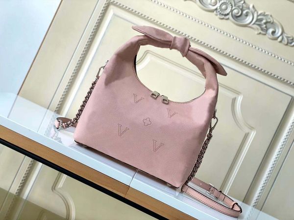 10a tier quality luxuries designerssmall handbag, spunctured leather, combined with knot-shaped handle
10a tier quality luxuries designerssmall handbag, spunctured leather, combined with knot-shaped handle