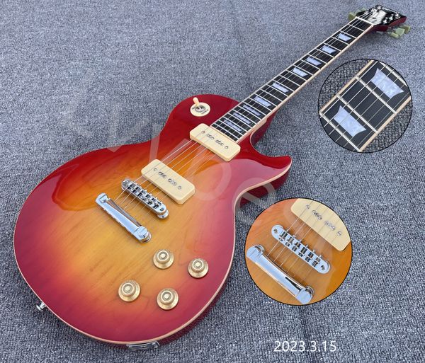 electric guitar with maple board cherry burst p90 pickups small pin bridge with voulte on head back
electric guitar with maple board cherry burst p90 pickups small pin bridge with voulte on head back