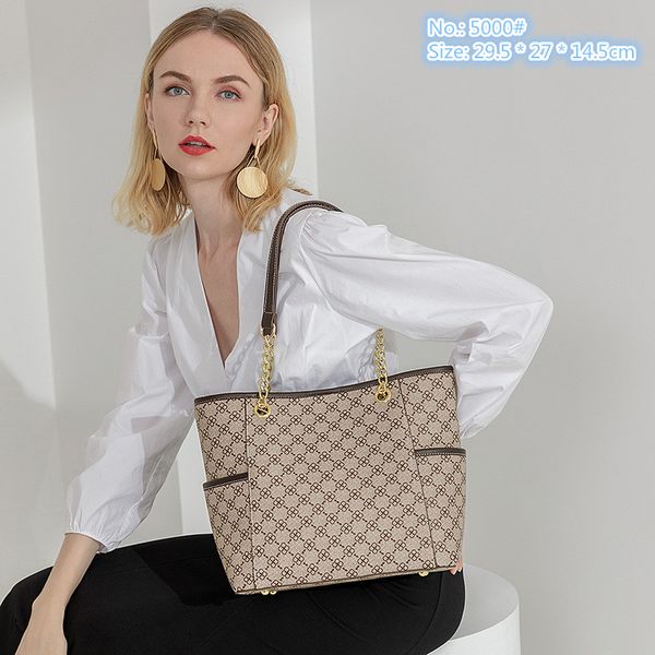 factory wholesale ladies shoulder bags classic retro print tote bag large-capacity wear-resistant leather handbag simple joker khaki fashion
factory wholesale ladies shoulder bags classic retro print tote bag large-capacity wear-resistant leather handbag simple joker khaki fashion