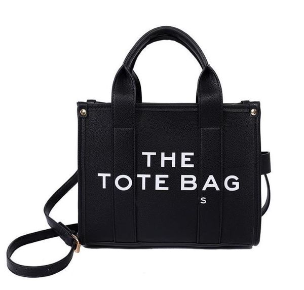 designer shoulder bags the leather mini tote bag black embossed front logo with back leather logo patch large capacity shopping bag multi-si
designer shoulder bags the leather mini tote bag black embossed front logo with back leather logo patch large capacity shopping bag multi-si