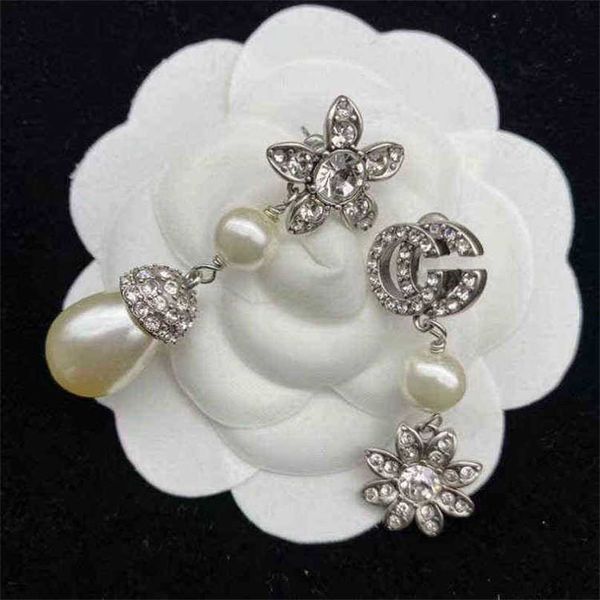 earrings 2023 rhinestone flower pearl long asymmetric brass silver needle earrings factory direct sales 70% off, Golden
earrings 2023 rhinestone flower pearl long asymmetric brass silver needle earrings factory direct sales 70% off, Golden