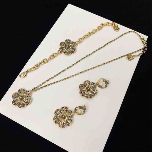 earrings ancient color diamond flower earrings women's doubles letter brass petal bracelet necklace set, Golden
earrings ancient color diamond flower earrings women's doubles letter brass petal bracelet necklace set, Golden