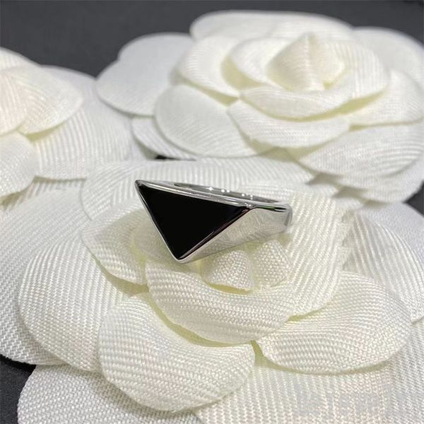 punk mens triangle designer rings for women hiphop black love enamel letter ring collection silver color bague finish couple luxury ring cla
punk mens triangle designer rings for women hiphop black love enamel letter ring collection silver color bague finish couple luxury ring cla
