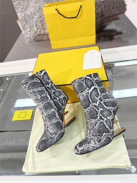 designer luxury first snakeskin leather boots with medium heel gold coloured metal boots bootie with original box, Black
designer luxury first snakeskin leather boots with medium heel gold coloured metal boots bootie with original box, Black