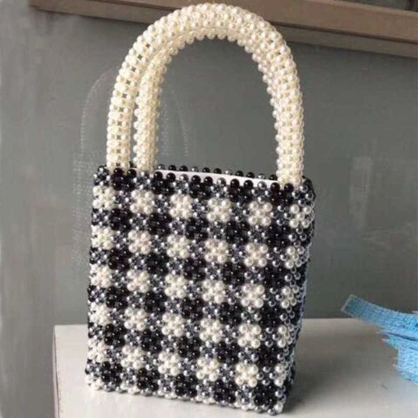 artificial beaded black and white check bag summer pearl women's pure artificial london style gradient 230304
artificial beaded black and white check bag summer pearl women's pure artificial london style gradient 230304