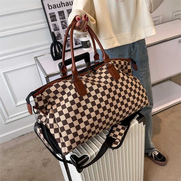 duffel bags new short distance travel bag women s large capacity korean hand multi functional fashionable luggage 230316
duffel bags new short distance travel bag women s large capacity korean hand multi functional fashionable luggage 230316