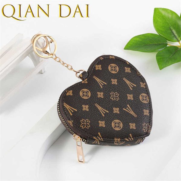 men's and women's fashion heart-shaped small purse mini pendant bag coin purse, Red;black
men's and women's fashion heart-shaped small purse mini pendant bag coin purse, Red;black