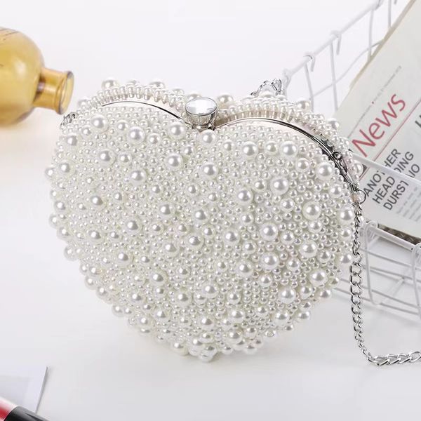 pearls heart shaped handbags wedding clutch purse full side beads mini wallets with chain shoulder bags for girls women, Black
pearls heart shaped handbags wedding clutch purse full side beads mini wallets with chain shoulder bags for girls women, Black