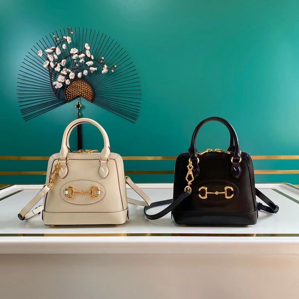 1955 mini shell bag handbag backpack designer leather women's men's backpack travel crossbody bag handbag schoolbag shoulder bag s
1955 mini shell bag handbag backpack designer leather women's men's backpack travel crossbody bag handbag schoolbag shoulder bag s