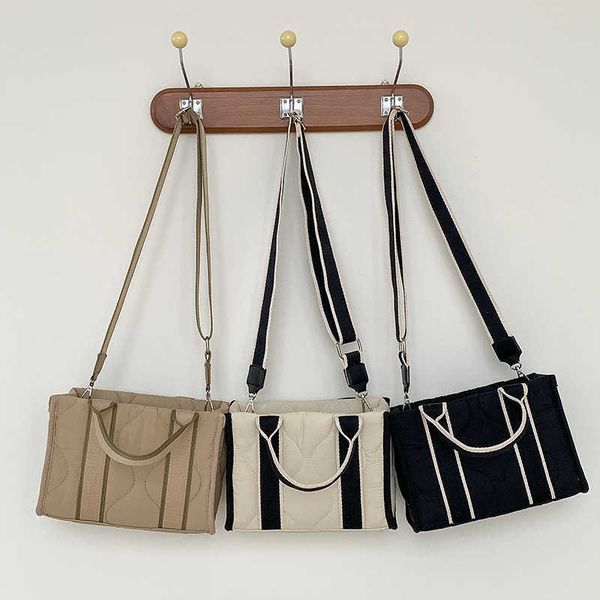 new high capacity handheld bag women's commuter fashion nylon buttot bag spliced crossbody shoulder bag
new high capacity handheld bag women's commuter fashion nylon buttot bag spliced crossbody shoulder bag