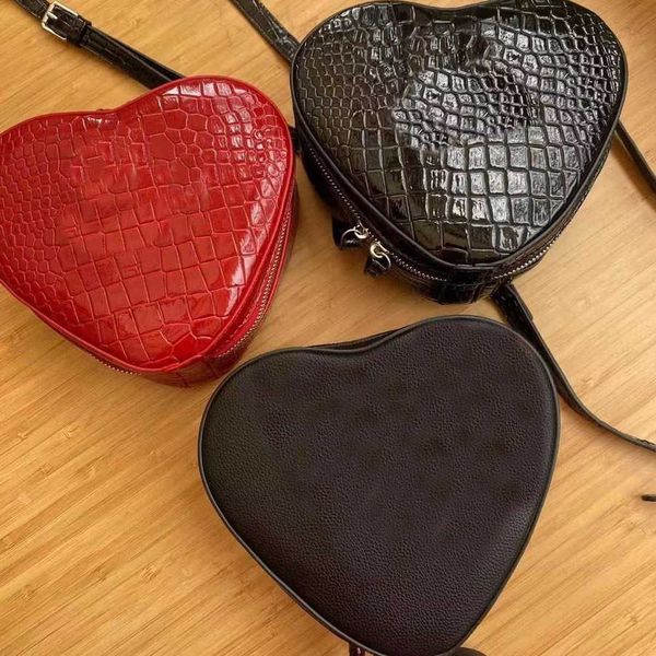 3 styles heart shoulders bags crocodile pattern women luxury brand designer clutch fashion single messengers purses 230318
3 styles heart shoulders bags crocodile pattern women luxury brand designer clutch fashion single messengers purses 230318