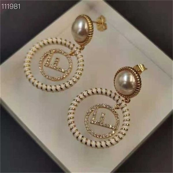 2023 designer new fashion jewelry aoxing letter classic mini tassel pearl earrings simple diamond earrings, Golden
2023 designer new fashion jewelry aoxing letter classic mini tassel pearl earrings simple diamond earrings, Golden