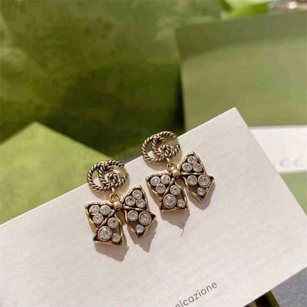 2023 designer new s925 silver needle brass old minority personality bow, full diamond earrings, family earrings, Golden
2023 designer new s925 silver needle brass old minority personality bow, full diamond earrings, family earrings, Golden