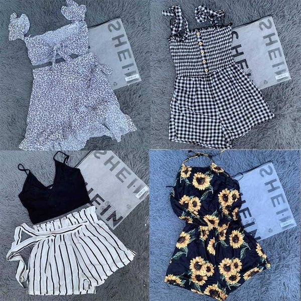 women's mix brand style dresses t-shirts small shirts pants skirts cut label stock products, Black;gray
women's mix brand style dresses t-shirts small shirts pants skirts cut label stock products, Black;gray