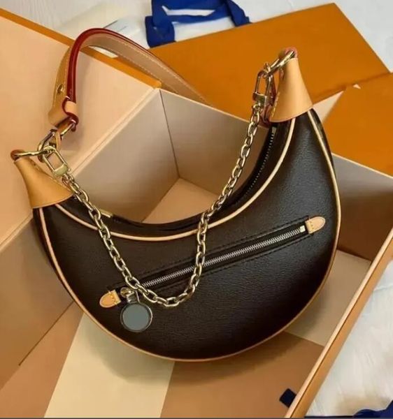 luxury designer bag women handbags loop moon purse brown flower lady tote brand letter leather crossbody shoulder bag wallet size 23x7x13cm
luxury designer bag women handbags loop moon purse brown flower lady tote brand letter leather crossbody shoulder bag wallet size 23x7x13cm