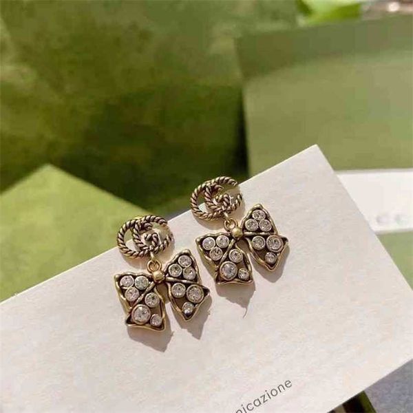 2023 designer new s925 silver needle brass old minority personality bow, full diamond earrings, family earrings, Golden
2023 designer new s925 silver needle brass old minority personality bow, full diamond earrings, family earrings, Golden